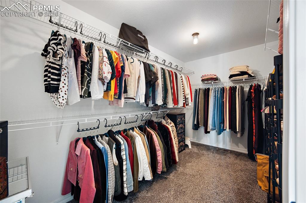 Image 25 of 41: Walk-In Closets