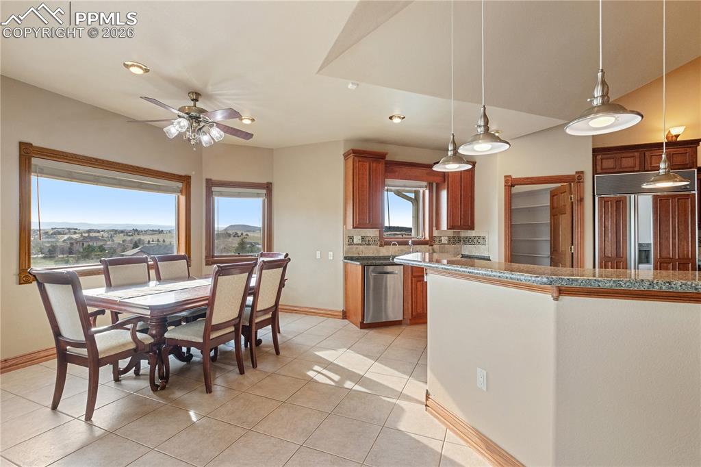 Image 10 of 50: Eat in kitchen with mountain views