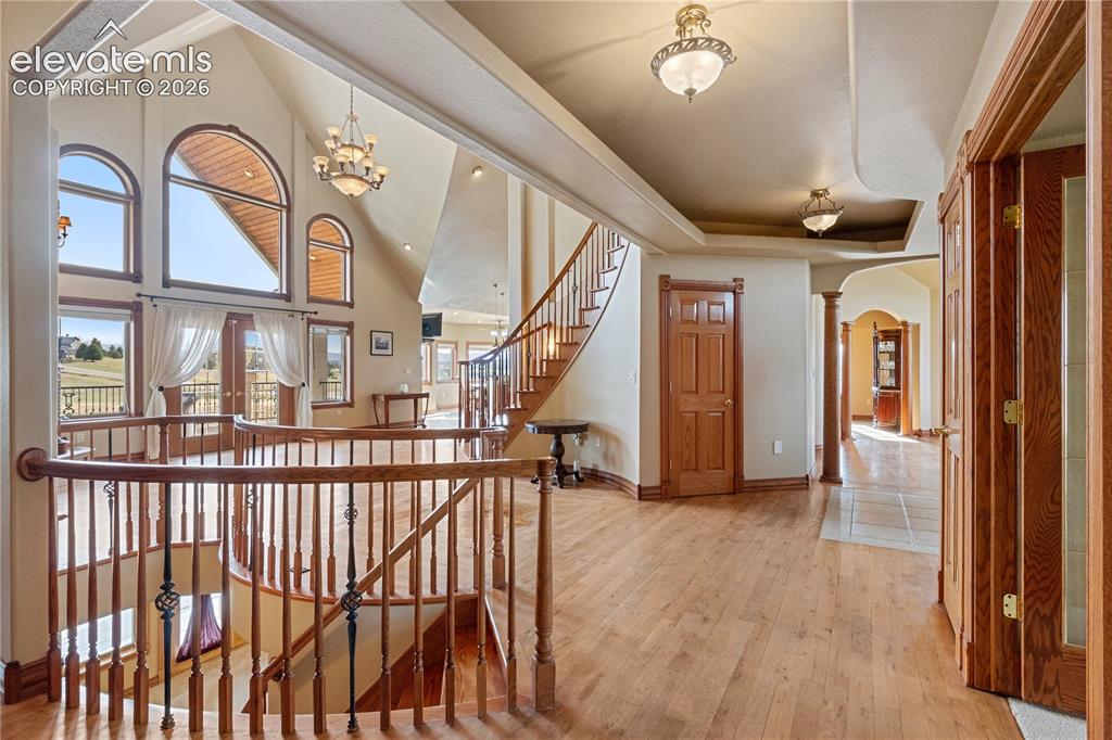 Image 13 of 50: Dining room, looking into living room. Window to kitchen.