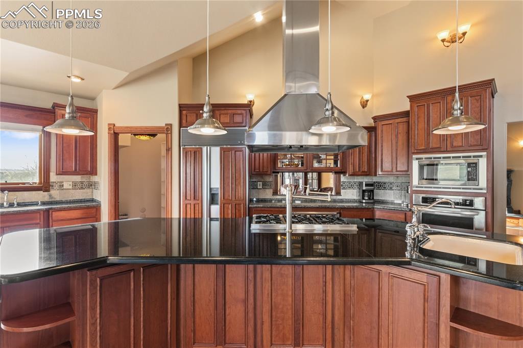 Image 8 of 50: Kitchen looking toward dining room