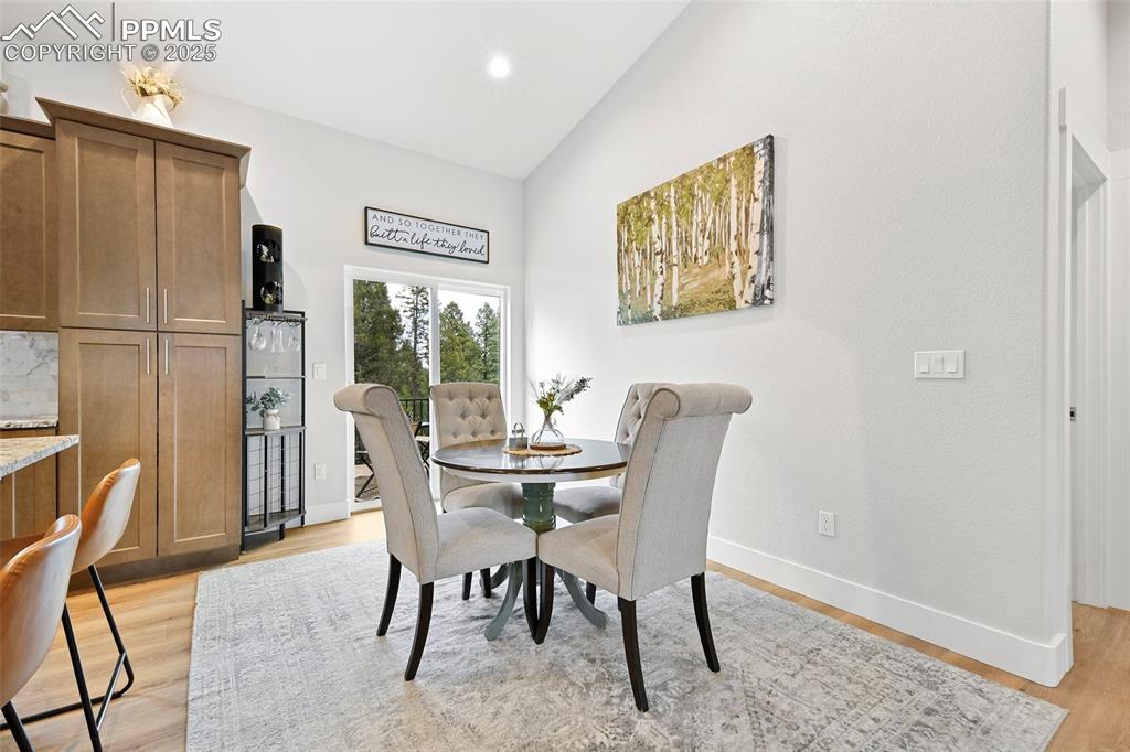 Image 10 of 40: Enjoy Outdoor Entertaining on the Composite Deck off the Kitchen Dining are