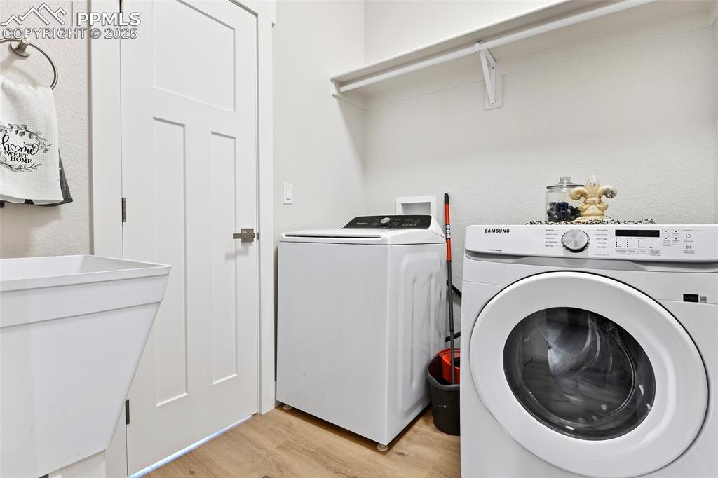 Image 28 of 40: Laundry Room with Deep Laundry Sink