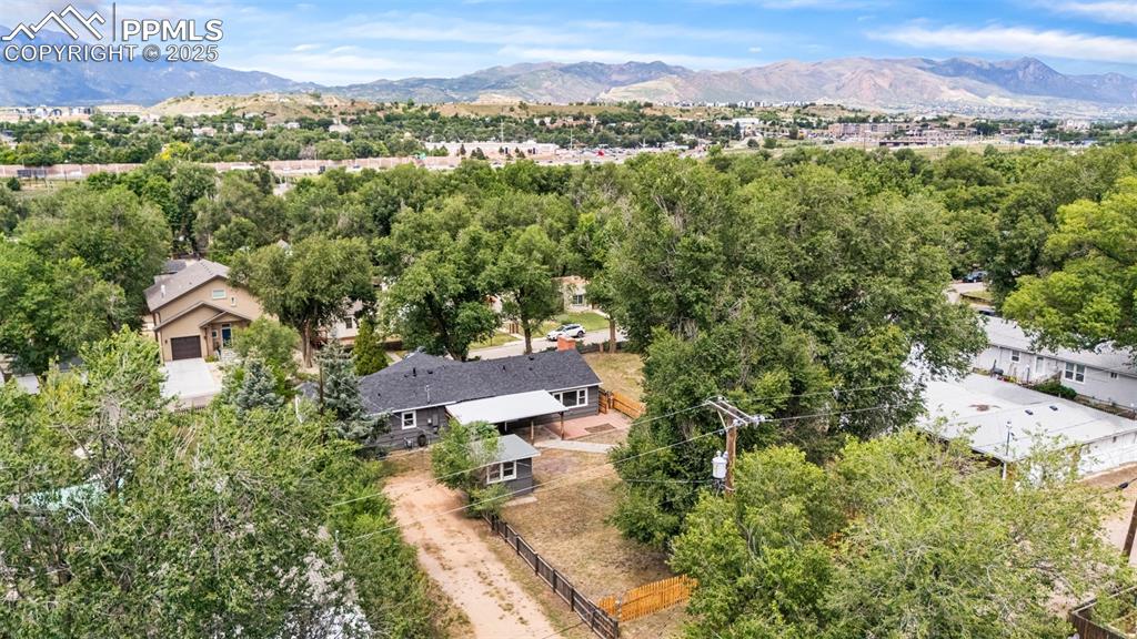 Image 33 of 41: Drone / aerial view of a mountain backdrop