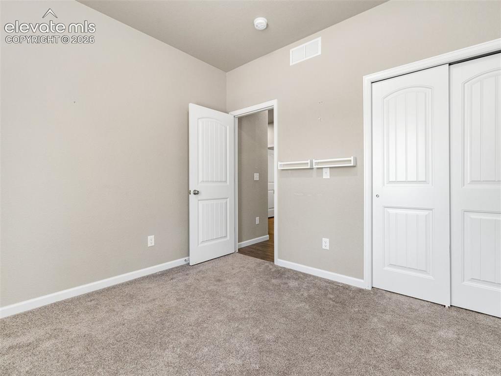 Image 12 of 19: Bedroom