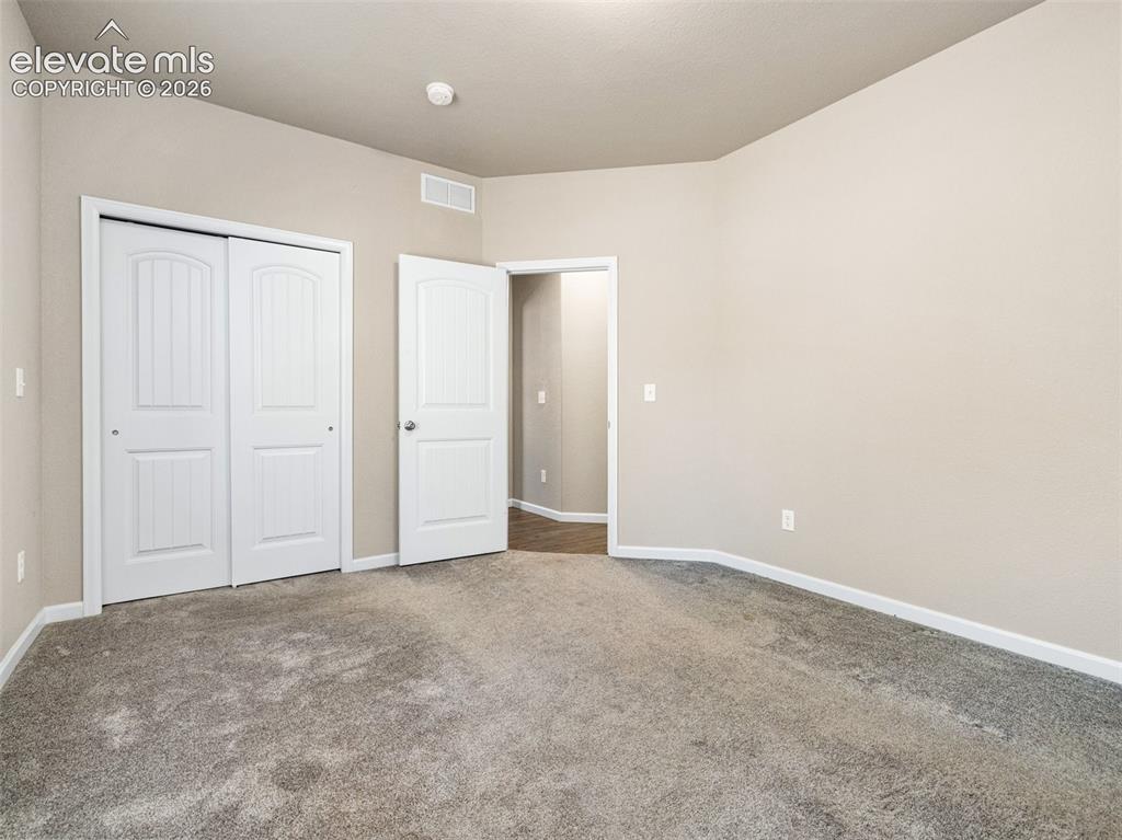 Image 14 of 19: Bedroom