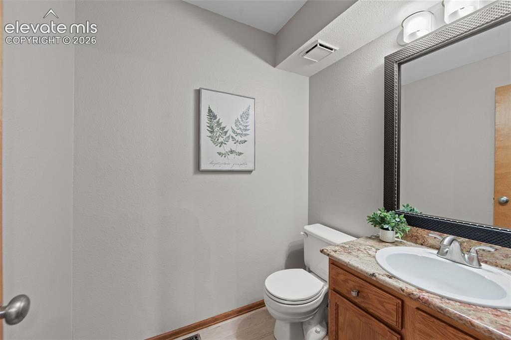 Image 12 of 35: Main level powder room