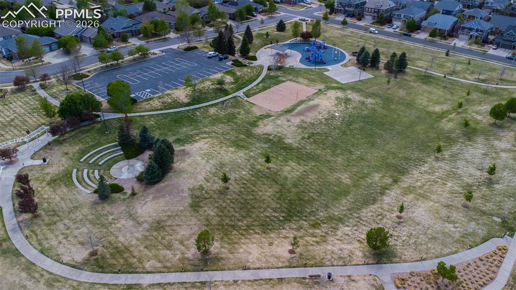Image 40 of 40: Well manicured, low maintenance fenced yard to enjoy outside fun and the Co