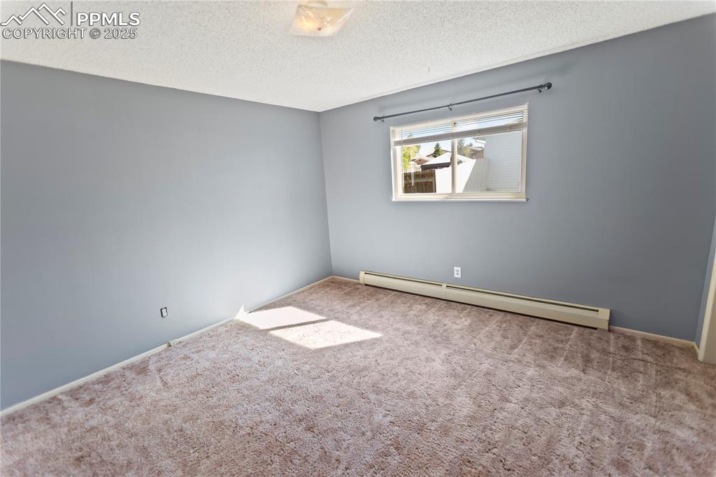 Image 21 of 28: Master Bedroom