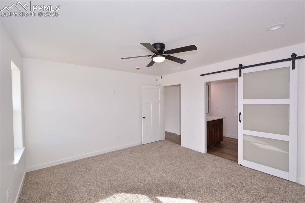 Image 14 of 24: Master Bedroom