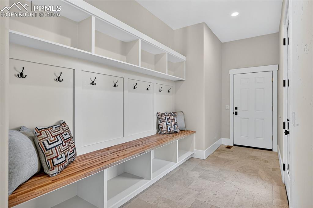 Image 38 of 49: Mudroom with baseboards and recessed lighting