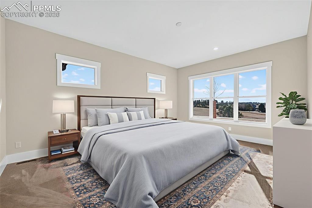 Image 43 of 49: Bedroom with baseboards