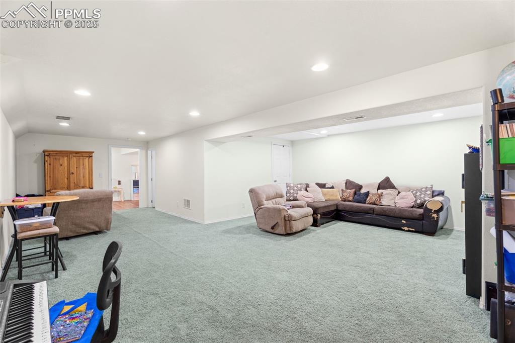 Image 4 of 29: large downstairs gathering space