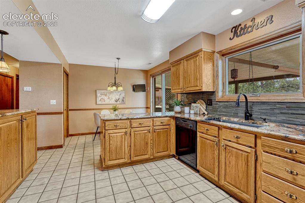 Image 19 of 50: View of the Dining Nook from the Kitchen.