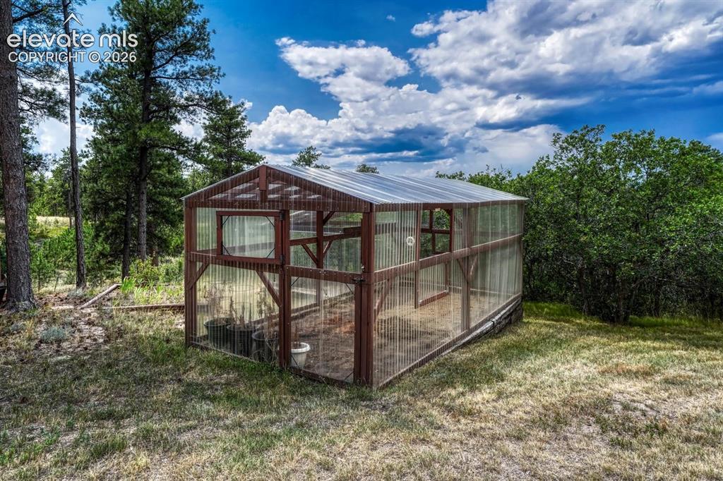 Image 43 of 50: Greenhouse.