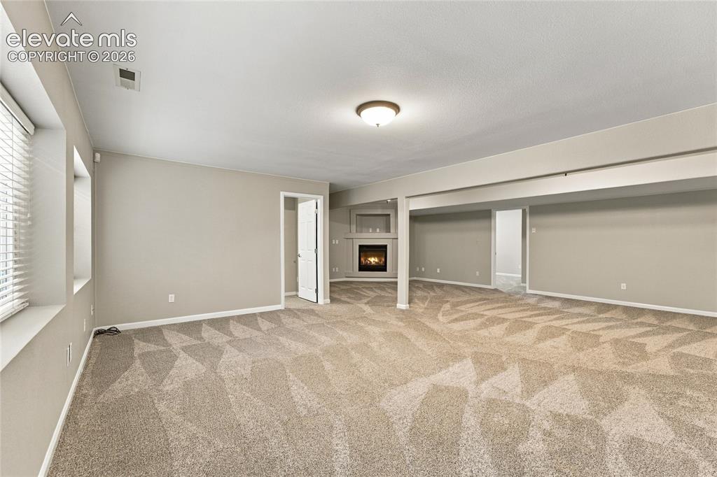 Image 17 of 24: lots of space in the recreation room 