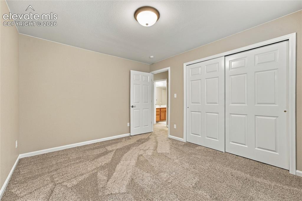 Image 22 of 24: basement bedroom with spacious closet 