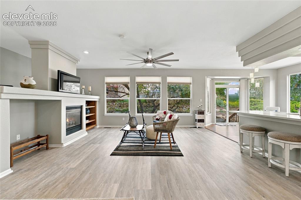 Image 5 of 25: new luxury vinyl with new interior paint and new high quality ceiling fan