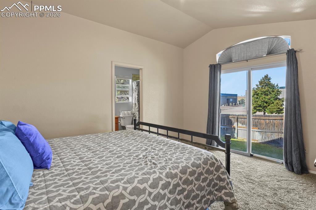 Image 12 of 21: The primary bedroom has its own private bathroom and walk-in closet.