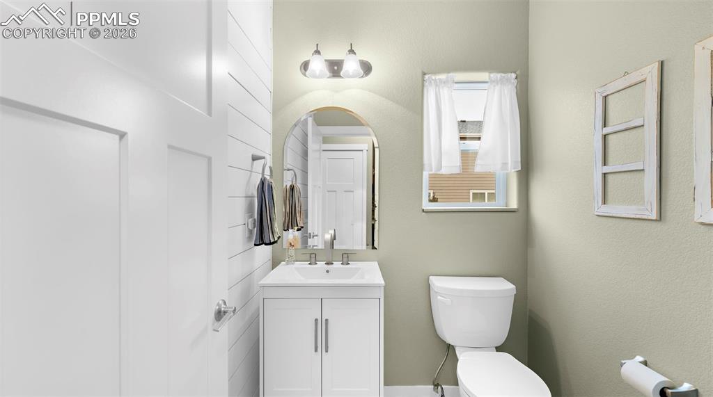 Image 12 of 43: Bathroom with vanity and toilet