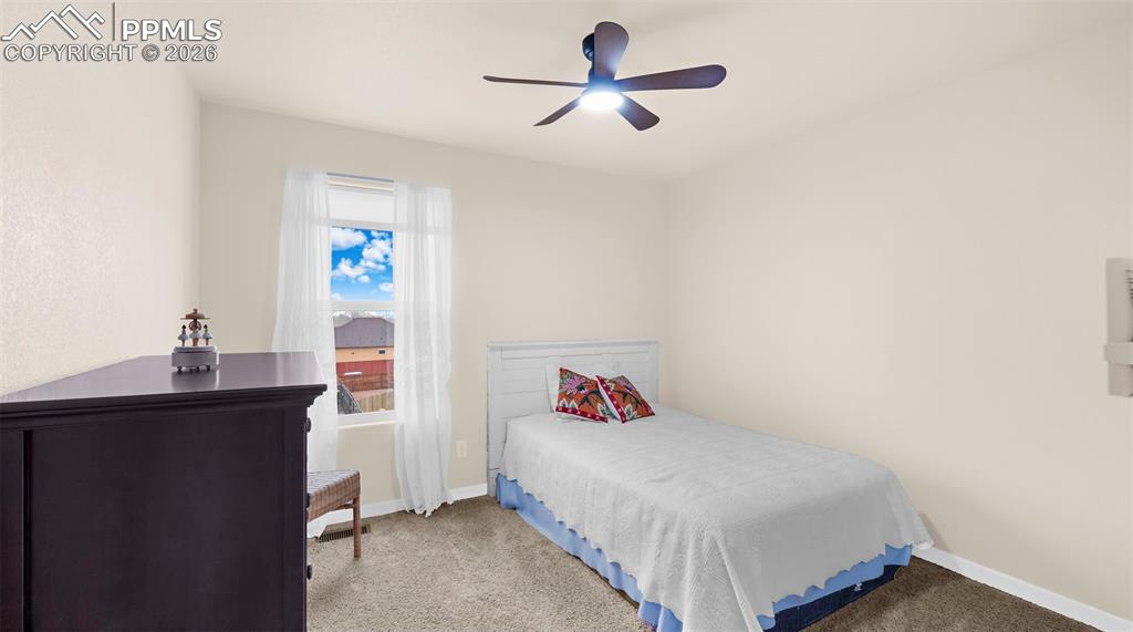 Image 16 of 43: Bedroom featuring carpet flooring and a ceiling fan