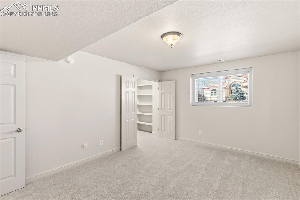 Image 18 of 39: Bedroom