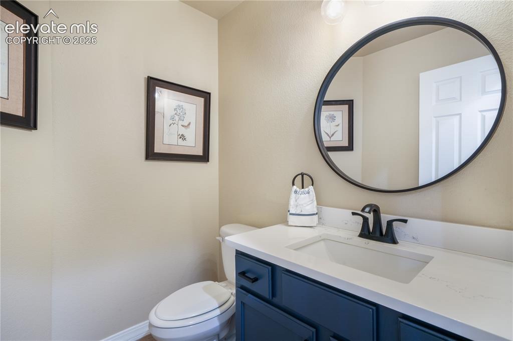 Image 18 of 50: Main Level Powder Bathroom