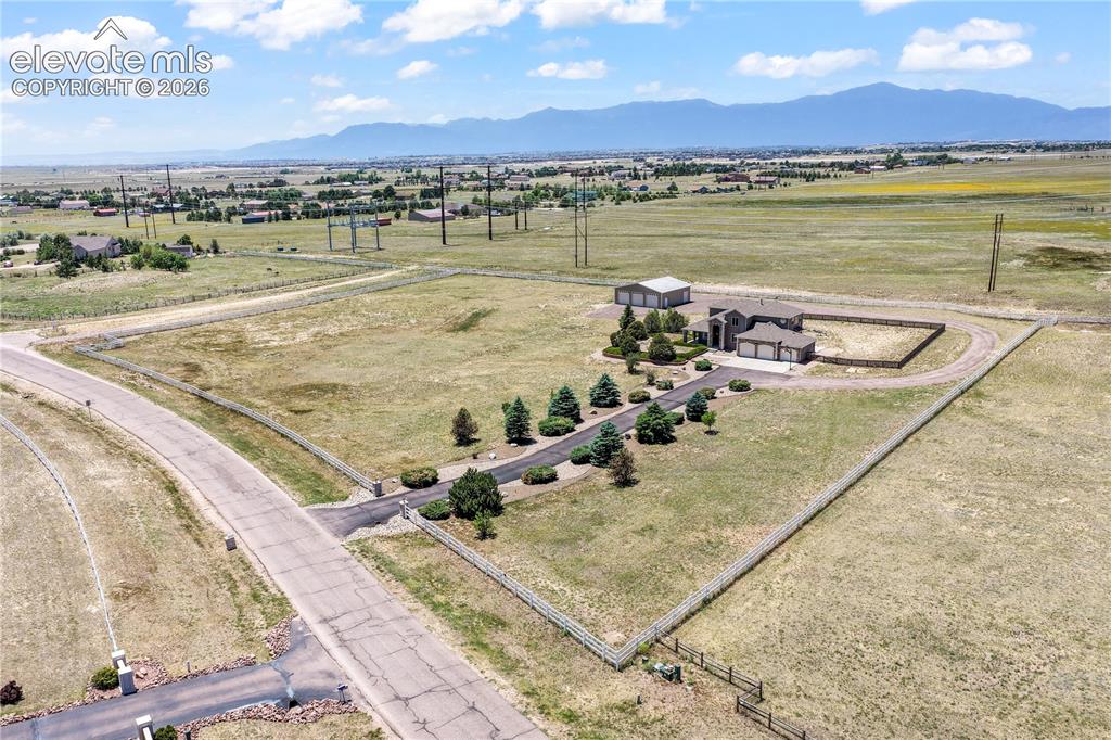 Image 3 of 50: Property is Fully Fenced with Detached Structure