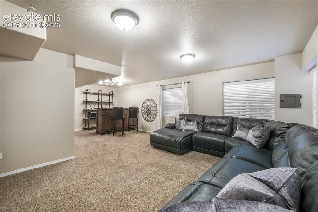 Image 35 of 50: Large Basement Family Room with Endless Possibilities