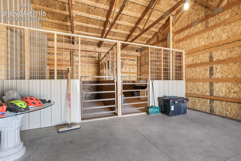 Image 46 of 50: 2 Inside Stalls for Horses