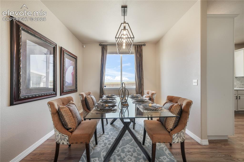Image 6 of 50: Formal Dining Room with View