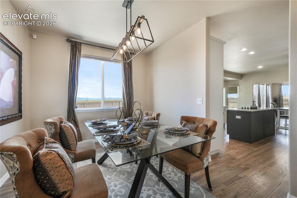 Image 7 of 50: Formal Dining Room with View