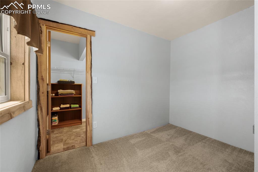 Image 13 of 27: View of carpeted spare room