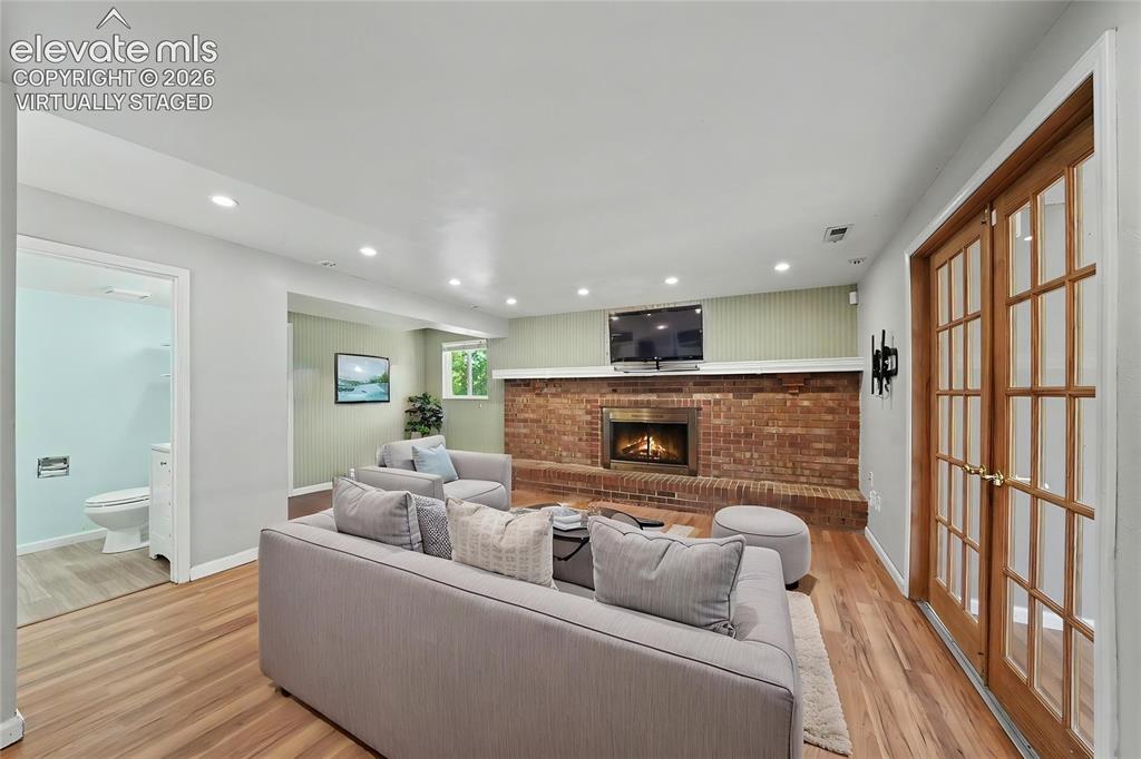 Image 10 of 30: Virtually Staged Family Room