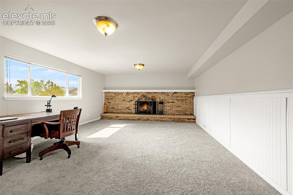 Image 11 of 40: Stainless steel appliance suite featuring a refrigerator, range, microwave,