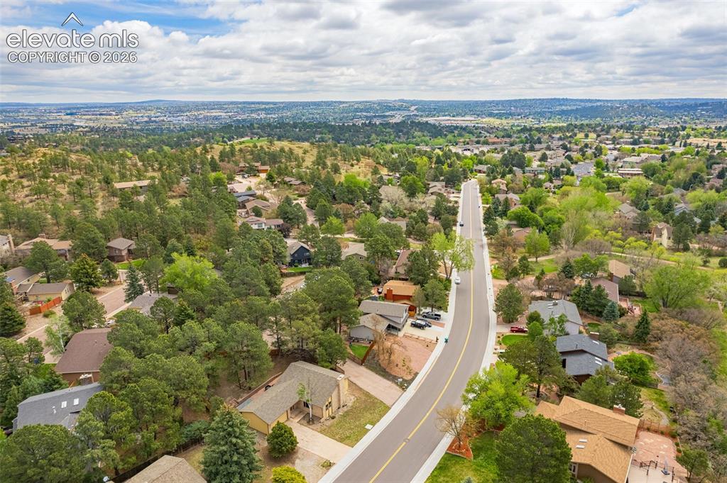 Image 36 of 40: Expansive neighborhood featuring mature trees and winding streets