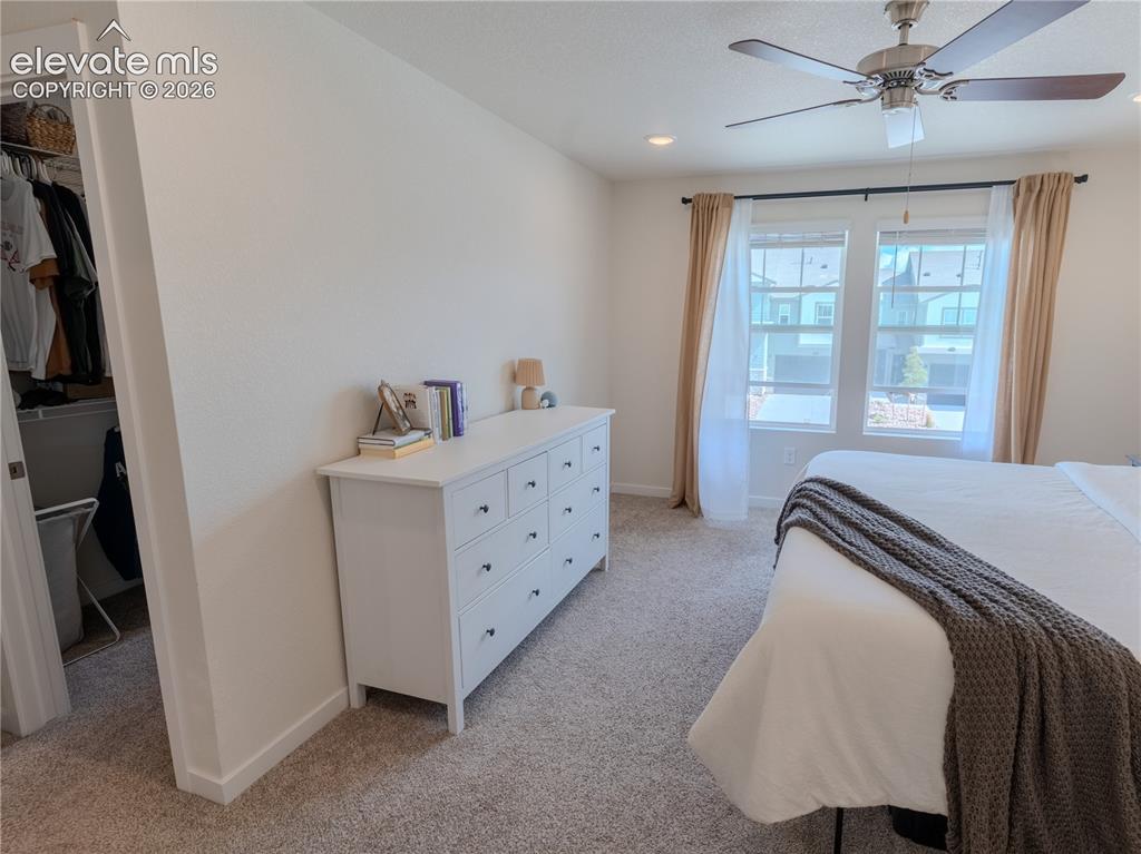Image 21 of 46: Primary Bedroom with view of Primary closet