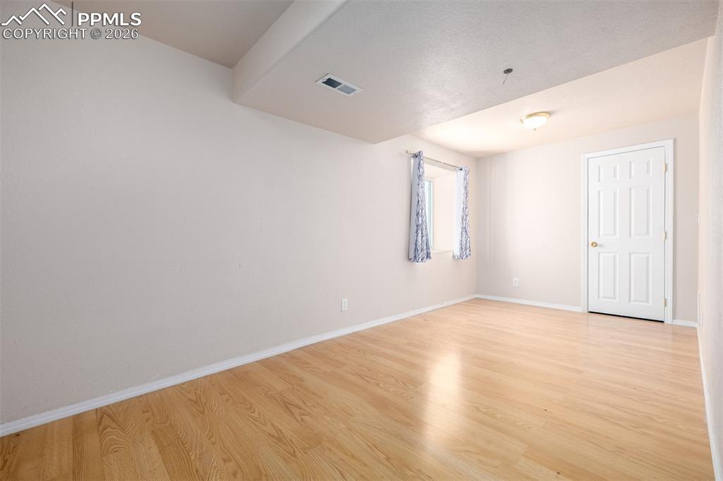 Image 22 of 37: Lower Level Bedroom with Walk In Closet