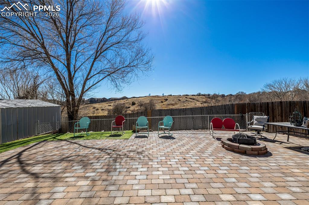 Image 31 of 37: Beautiful Paver Patio & Backyard to Open Space