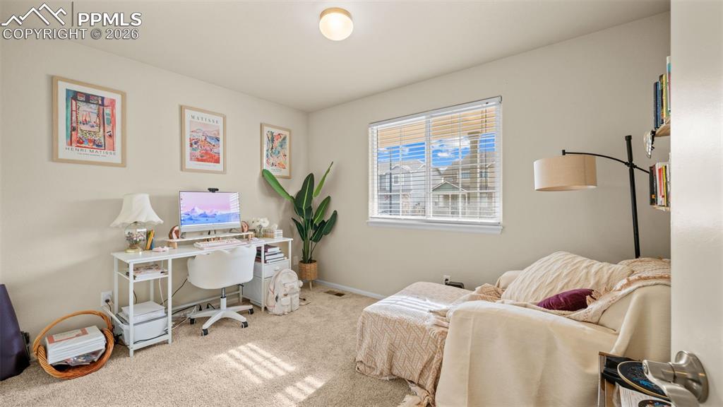 Image 5 of 28: Office space with light carpet and baseboards