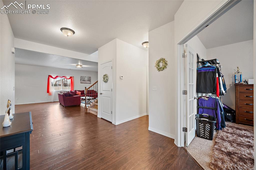 Image 10 of 37: As you enter the home, office is to your left. (right now being used as a 4