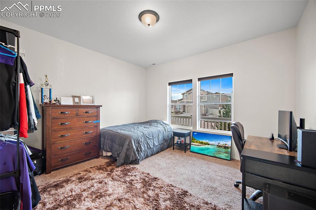 Image 17 of 37: Main level Office being used as a bedroom. 