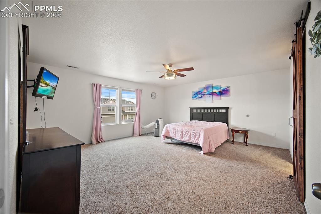 Image 23 of 37: Large Primary bedroom! 