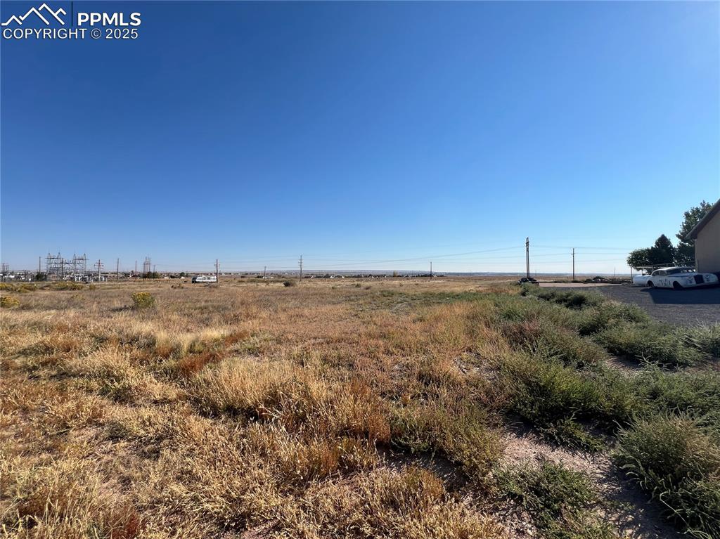 Caption: View of yard featuring a rural view