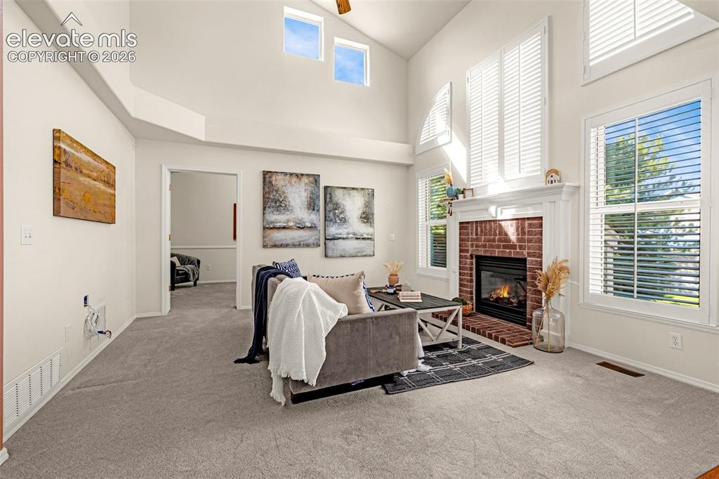 Image 13 of 41: Soaring 2 story high ceiling in the Great Room