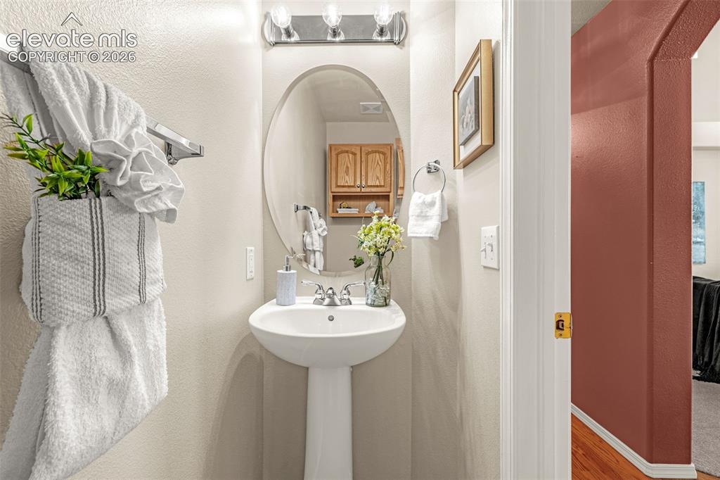 Image 17 of 41: Main level half bath