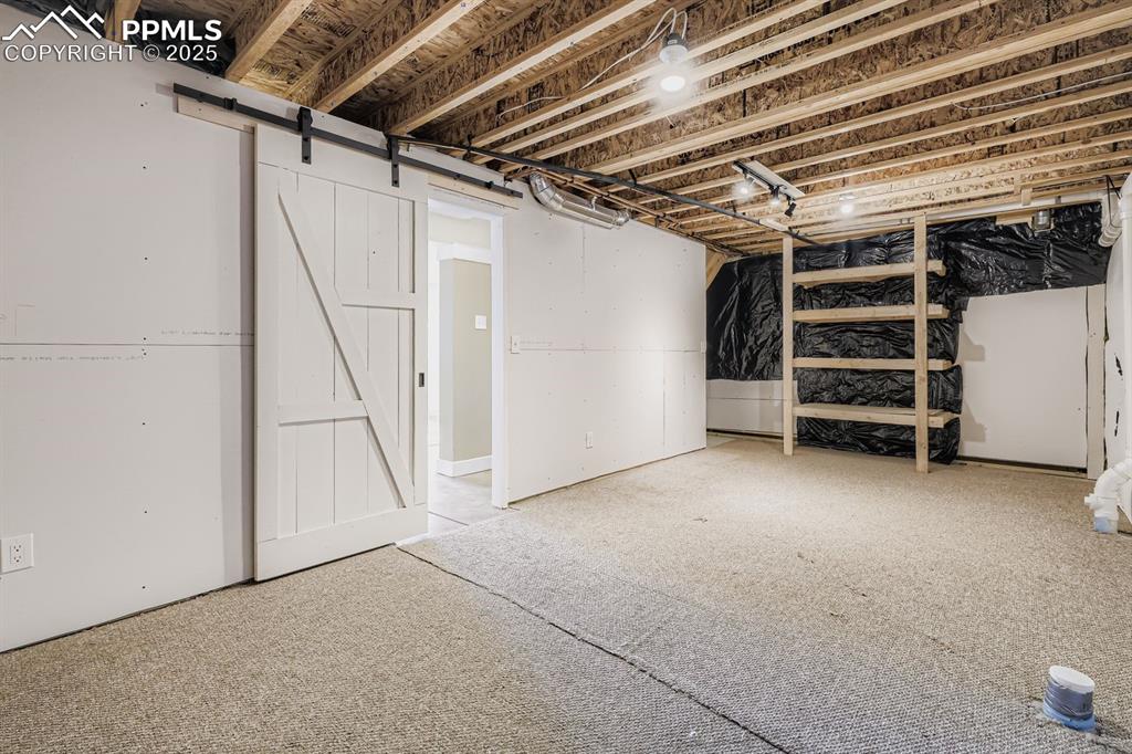 Image 23 of 27: Large storge room