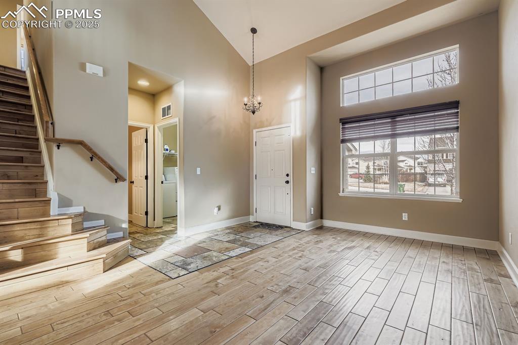 Image 4 of 27: Formal living room off entryway