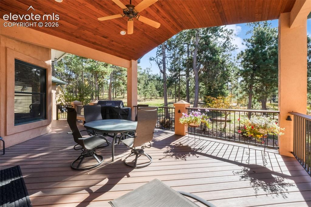 Image 16 of 50: Covered Composite Deck for Year Round Enjoyment