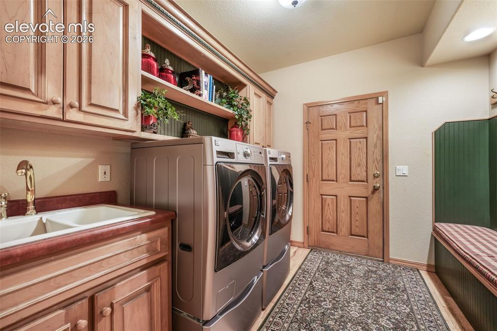 Image 20 of 50: Utility Sink and a Pantry You Have to See to Believe