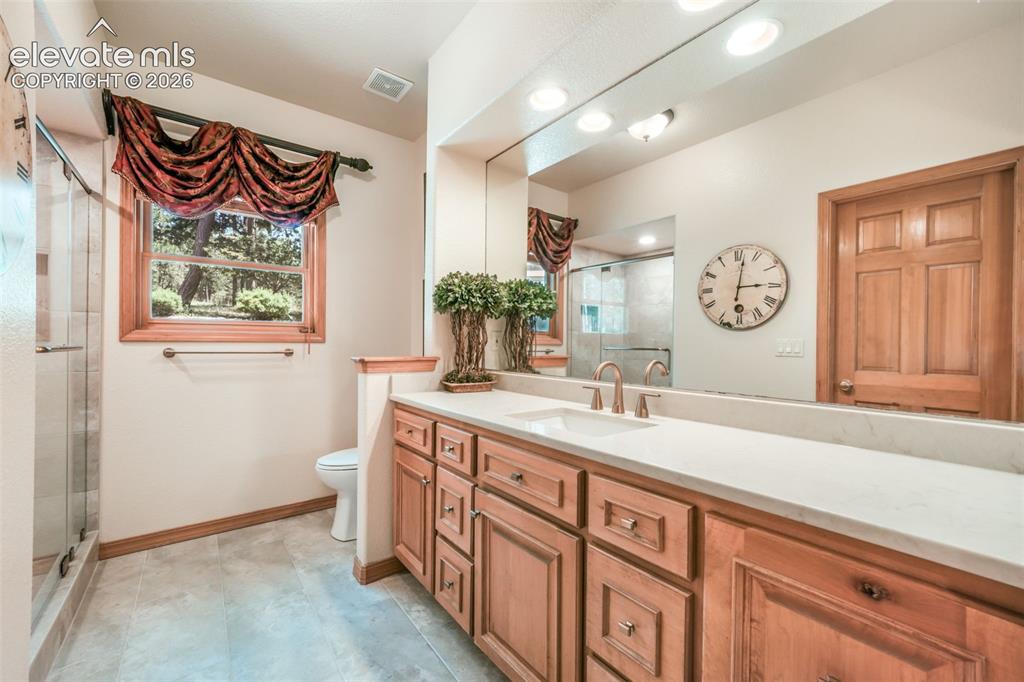Image 41 of 50: Newly Renovated with Quartz Counters, Framless Glass Shower Door and Kohler